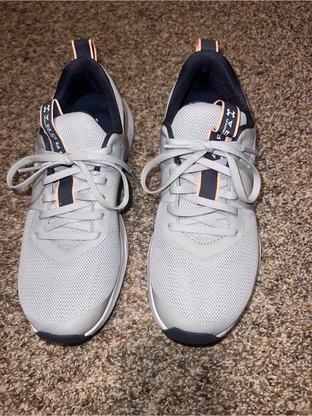Under Armour Women’s Train Light Gray Athletic Sneakers with Pink Accents
